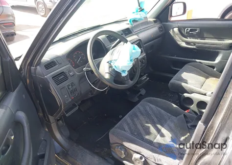 1999 Honda Cr-V Lx z USA, uszkodzony, nr VIN JHLRD2841XC019070